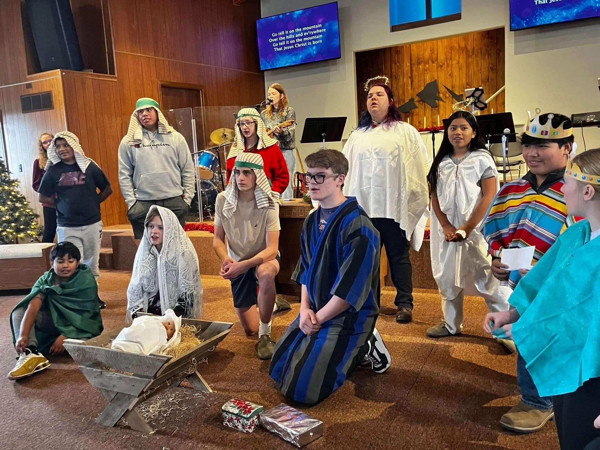 Church congregation nativity scene